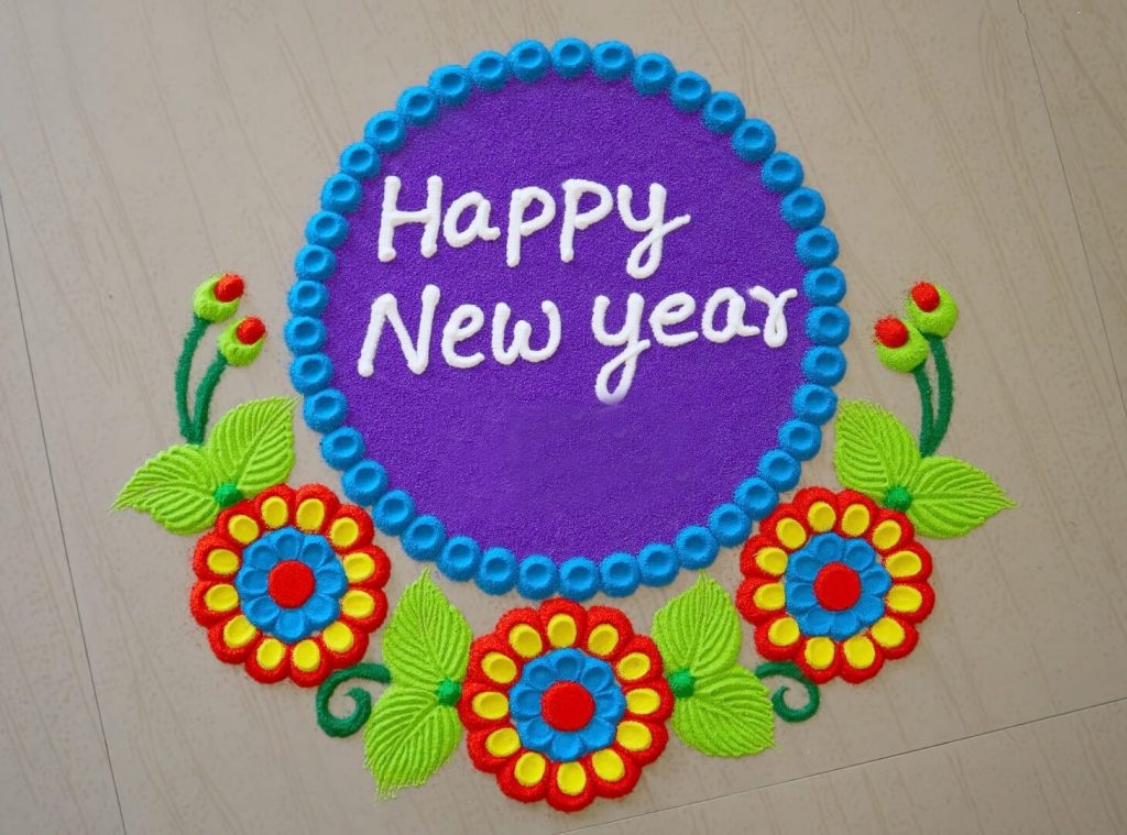 Colorful and creative New Year Rangoli design